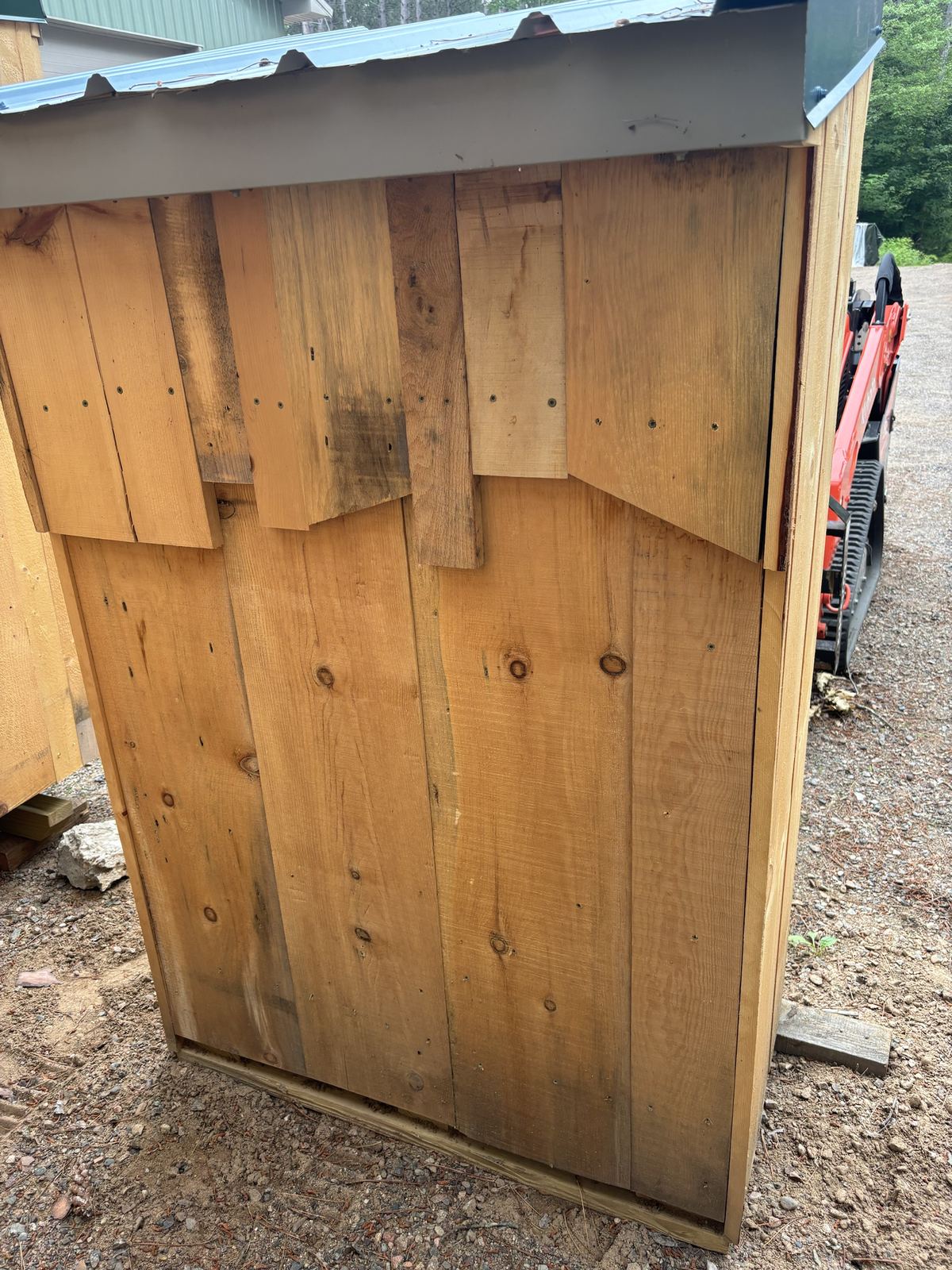 Close view of reclaimed boards on the back of a shed